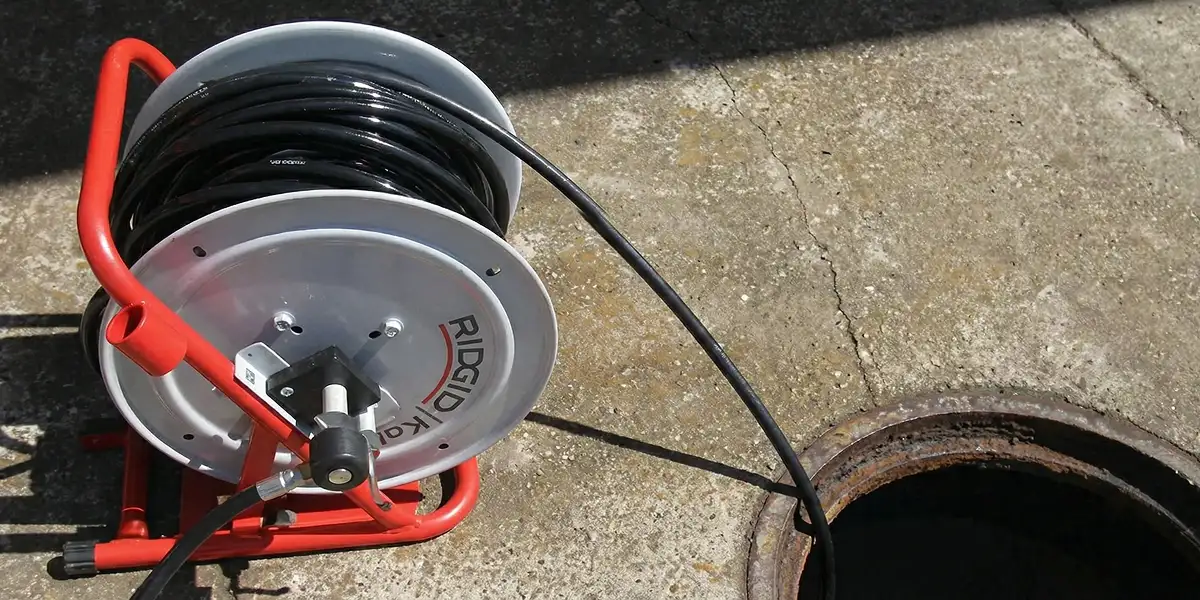 sewer rodding equipment prepared to clear clogged sewer lines in Ogden, UT