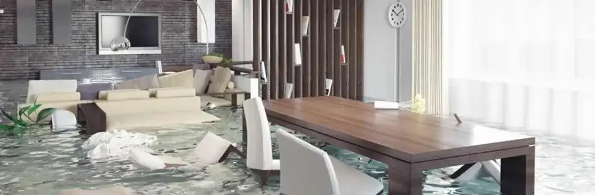 home interior affected by water damage with flooded floors and displaced furniture in Ogden, UT